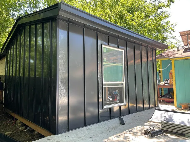 Black standing seam metal wall panels for Metal Roof Installation in Lawrenceville