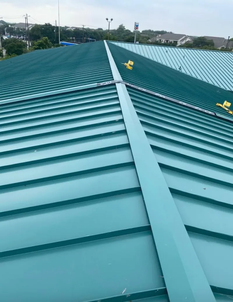 Green commercial metal roof ridge and valley for Metal Roof Repair in Lawrenceville