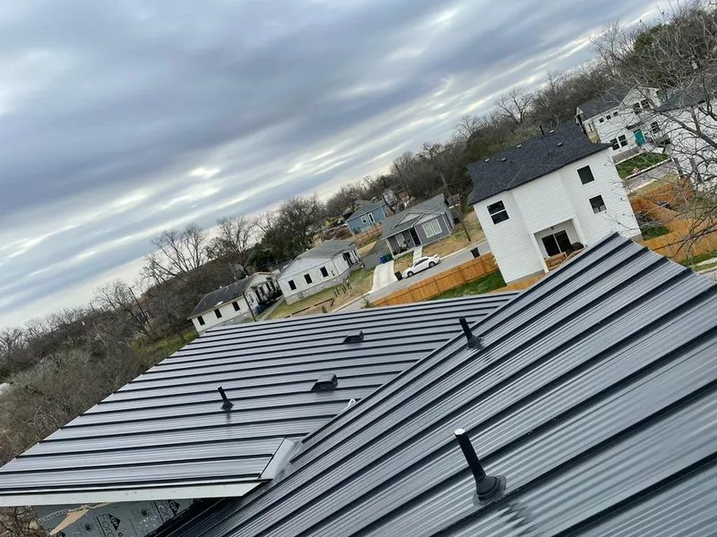 Standing seam metal roof panels with vents for Skylight Repair in Lawrenceville